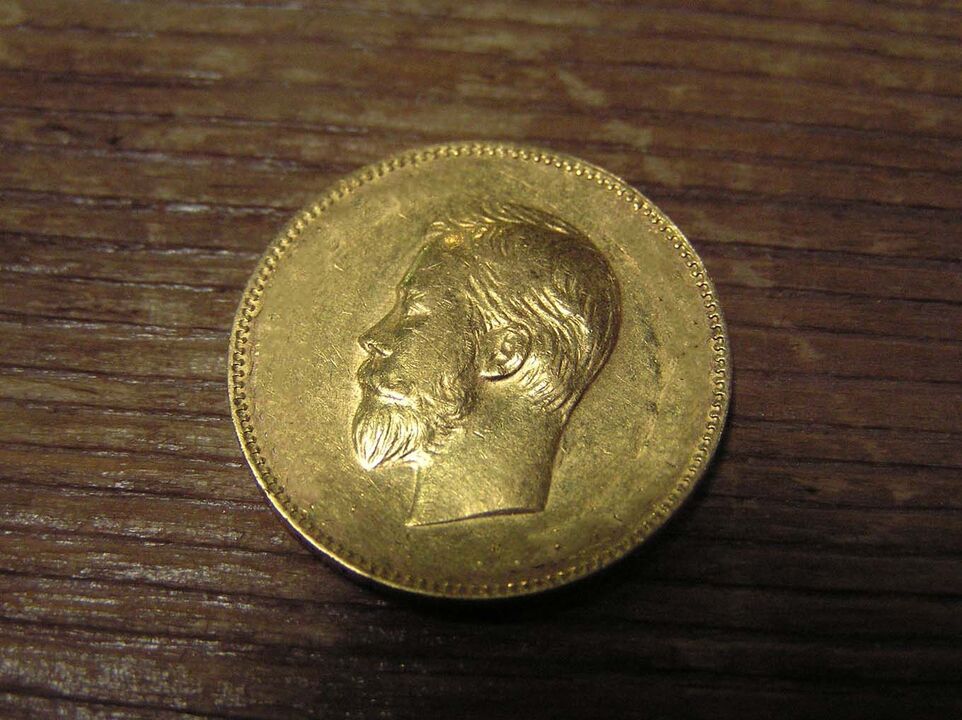 zlatá minca pre finančné blaho